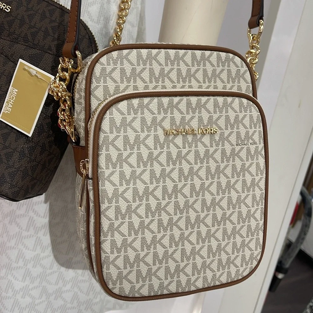 MICHAEL KORS Jet Set Travel Md NS Logo Crossbody Flight Bag Messenge Vanilla NWT